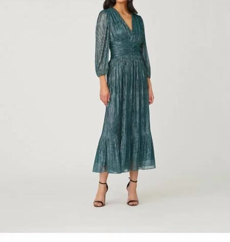 Your Timeless Wardrobe Awaits Clara Blouson Dress In Teal Metallic